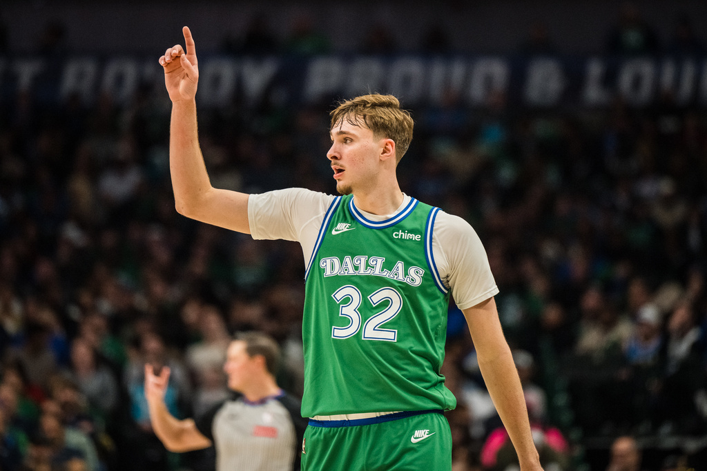 Dallas Mavericks forward Cooper Flagg gestures during an NBA basketball game against the Charlotte Hornets, Thursday, Jan. 29, 2026, in Dallas. (AP Photo/Jessica Tobias)