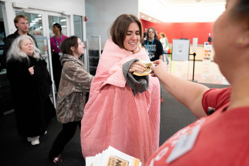 Shoppers enter a Kohl's department store for Black Friday to shop for deals, Friday, Nov. 28, 2025, in Woodstock, Ga. (AP Photo/Megan Varner)