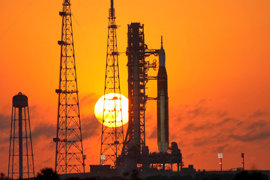 NASA's Space Launch System rocket with the Orion spacecraft set for the Artemis 2 mission is seen on Launch Complex 39B at sunrise at the Kennedy Space Center, Tuesday, March 24, 2026, in Cape Canaveral, Fla. (AP Photo/John Raoux)