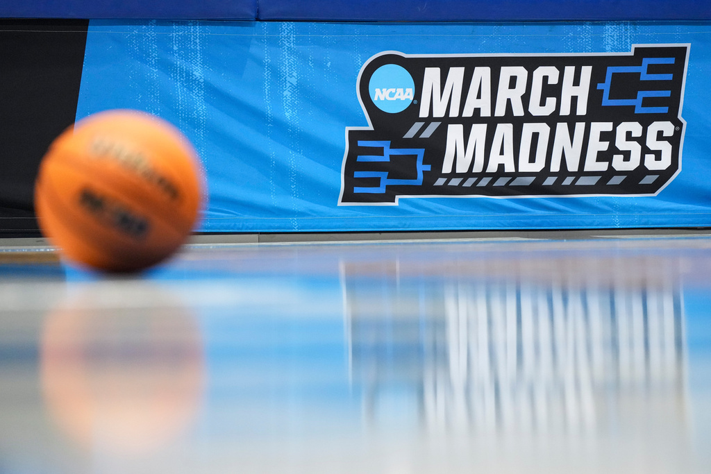 A general view of a basketball on the court during the first half of a First Four college basketball game between Lehigh and Prairie View A&M in the NCAA Tournament in Dayton, Ohio, Wednesday, March 18, 2026. (AP Photo/Jeff Dean)