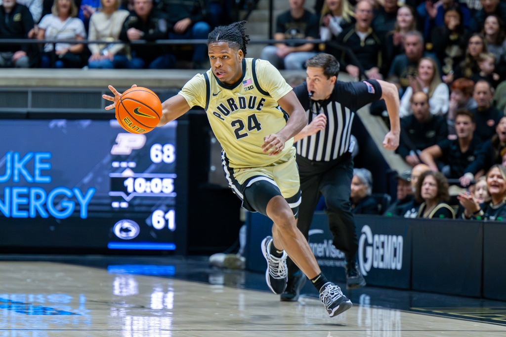 Purdue guard Gicarri Harris (24) breaks up court with the ball during the second half of an NCAA college basketball game against Penn State, Saturday, Jan. 10, 2026, in West Lafayette, Ind. (AP Photo/Doug McSchooler)
