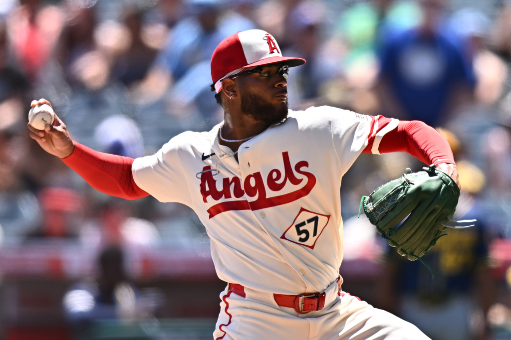 Los Angeles Angels pitcher Walbert Ureña delivers during the first inning of a baseball game against the Milwaukee Brewers, Sunday, Aug. 2, 2026, in Anaheim, Calif. (AP Photo/William Liang)