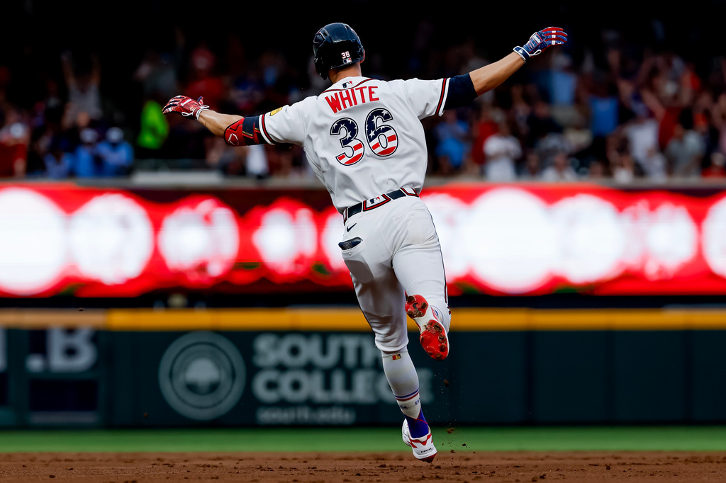 Atlanta Braves' Eli White reacts while rounding the bases after hitting solo home run against the New York Mets during the second inning of a baseball game, Saturday, July 4, 2026, in Atlanta. (AP Photo/Erik S. Lesser)