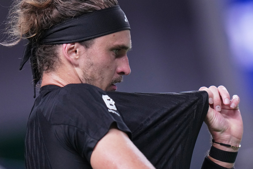 Alexander Zverev of Germany reacts during the men's singles match against Arthur Rinderknech of France, in the Shanghai Masters tennis tournament at Qizhong Forest Sports City Tennis Center, in Shanghai, China, Monday, October. 6, 2025. (AP Photo/Andy Wong)