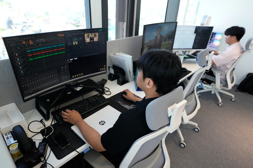 Employees at Seoul-based tech firm Vaice work at their office, South Korea, Friday, June 12, 2026. (AP Photo/Ahn Young-joon)