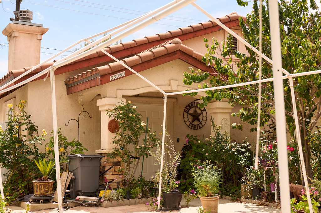 The family home of Celeste Rivas Hernandez, who was killed and found inside a vehicle owned by singer D4vd, is shown in Lake Elsinore, Calif., on Tuesday, April 21, 2026. (AP Photo/Damian Dovarganes)