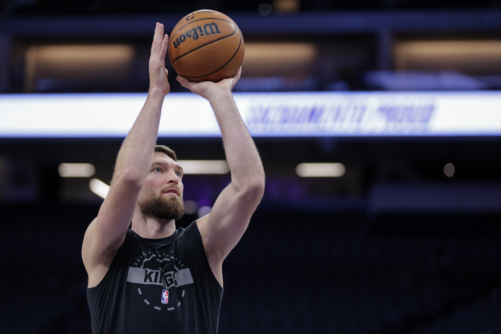 Sacramento Kings forward Domantas Sabonis warms up before an NBA basketball game against the Washington Wizards, Friday, Jan. 16, 2026, in Sacramento, Calif. (AP Photo/Scott Marshall)