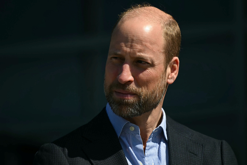 FILE - Britain's Prince William pays a visit to the headquarters of British Formula E team, Jaguar TCS Racing, at Kidlington, England, Thursday April 23, 2026. (Justin Tallis, Pool Photo via AP, file)