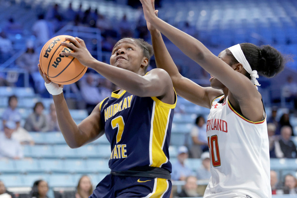 Murray State guard Haven Ford (2) drives against Maryland guard Mir McLean (10) during the first half in the first round of the NCAA college basketball tournament, Friday, March 20, 2026, in Chapel Hill, N.C. (AP Photo/Chris Seward)