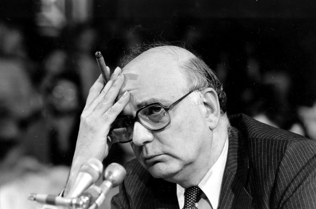 FILE - In this March 18, 1980, file photo, Federal Reserve Board Chairman Paul Volcker listens to a question as he testifies before the Senate Banking Committee in Washington (AP Photo/Chick Harrity, File)