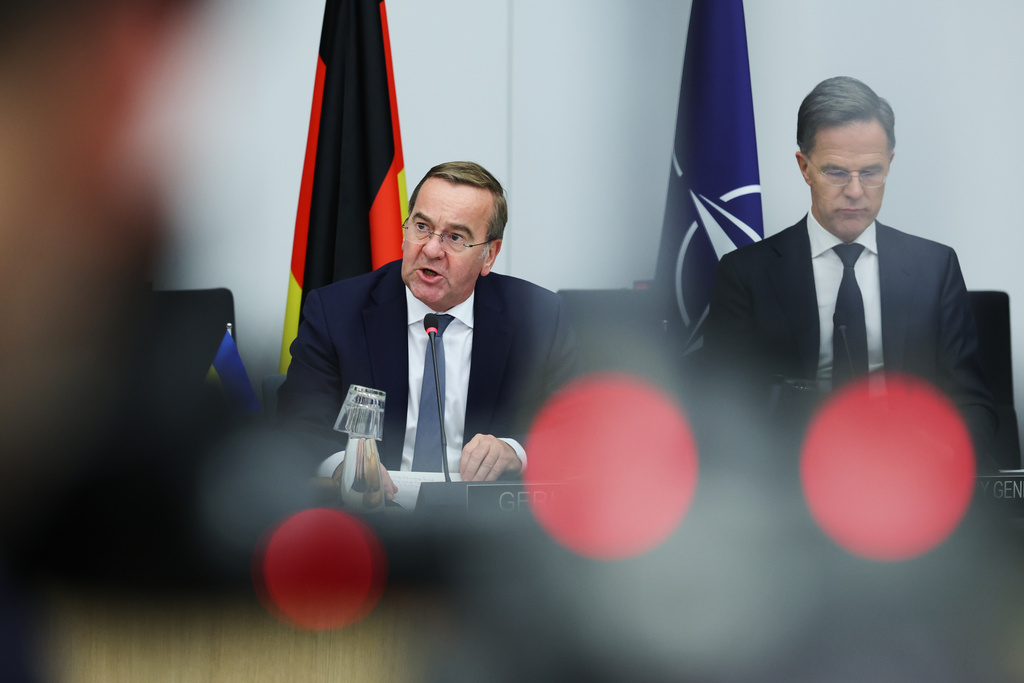 Germany's Defense Minister Boris Pistorius, left, addresses a meeting of the Ukraine Defense Contact Group at NATO headquarters in Brussels, Wednesday, Oct. 15, 2025 (AP Photo/Omar Havana)