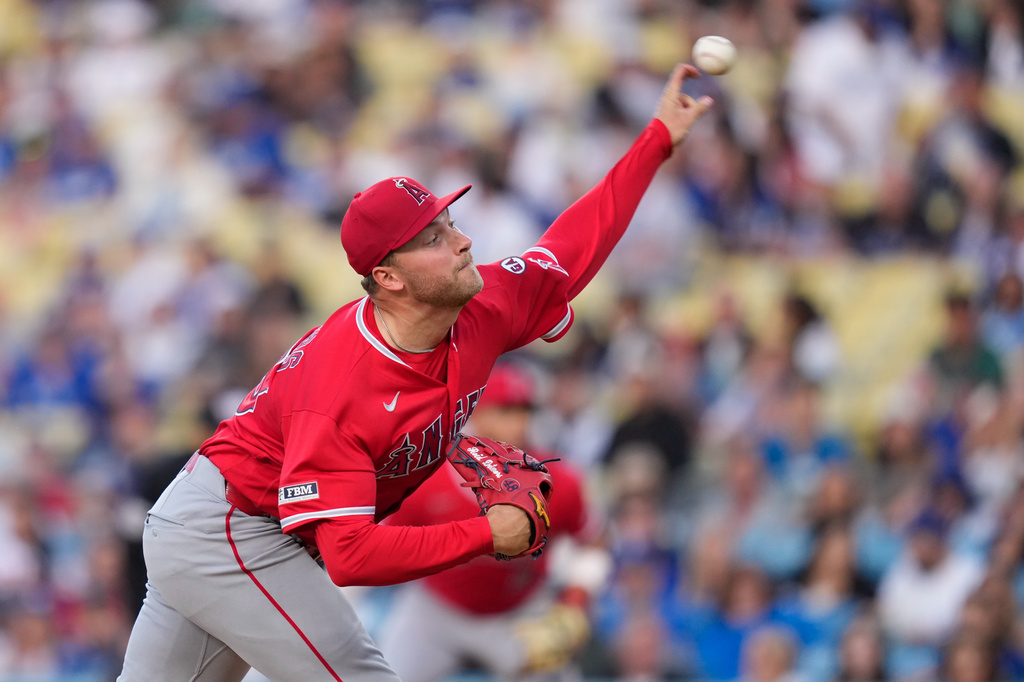 Los Angeles Angels starting pitcher Reid Detmers throws to the plate during the first inning of a baseball game against the Los Angeles Dodgers, Friday, June 5, 2026, in Los Angeles. (AP Photo/Mark J. Terrill)