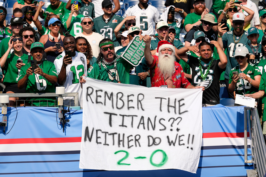 Philadelphia Eagles fans celebrate during the second half of an NFL football game against the Tennessee Titans, Sunday, Sept. 20, 2026, in Nashville, Tenn.(AP Photo/George Walker IV)
