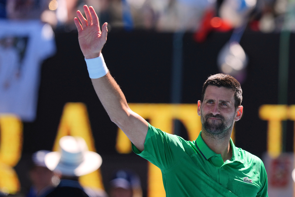 Novak Djokovic of Serbia waves after defeating Francesco Maestrelli of Italy in their second round match at the Australian Open tennis championship in Melbourne, Australia, Thursday, Jan. 22, 2026. (AP Photo/Aaron Favila)