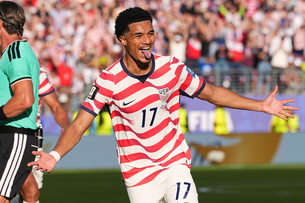 United States' Malik Tillman (17) celebrates after scoring on a free kick during the World Cup round of 32 soccer match between the United States and Bosnia in Santa Clara, Calif., near San Francisco, Wednesday, July 1, 2026. (AP Photo/Martin Meissner)