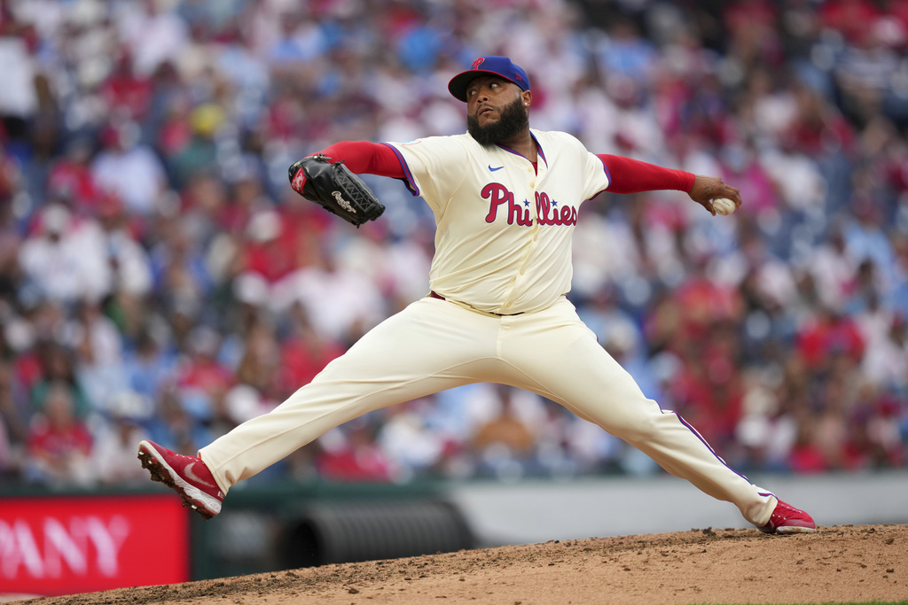 Philadelphia Phillies' José Alvarado pitches during the eighth inning of a baseball game against the Seattle Mariners Wednesday, Aug. 20, 2025, in Philadelphia. (AP Photo/Matt Slocum)