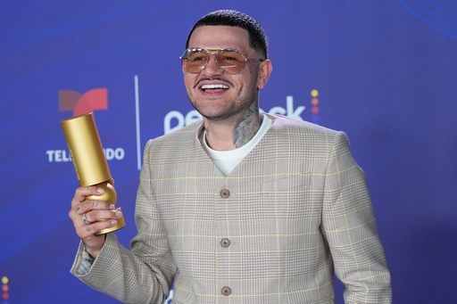 Kapo poses with the Top Album Pop Award at the Latin Billboard Awards Thursday, Oct. 23, 2025, in Miami. (AP Photo/Marta Lavandier) Kapo poses with the Top Album Pop Award at the Latin Billboard Awards Thursday, Oct. 23, 2025, in Miami. (AP Photo/Marta Lavandier)