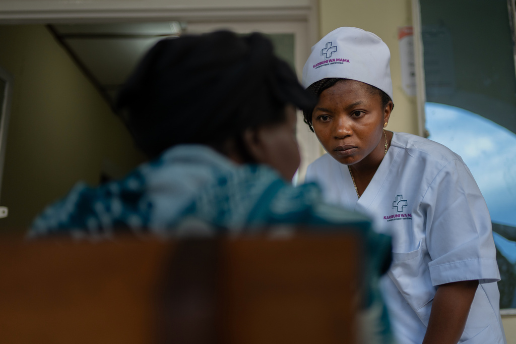 Dr Elizabeth Furaha, medical director of Karibuni wa Mama, speaks with a relative of a patient at Sofepadi Hospital in Bunia, Congo, Friday, May 29, 2026. (AP Photo/Moses Sawasawa)