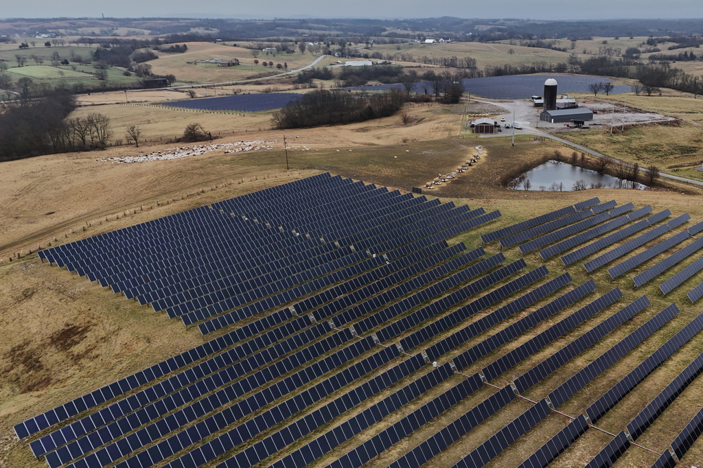Solar panels operate at a farm Wednesday, Jan. 14, 2026, in Lancaster, Ky. (AP Photo/Joshua A. Bickel)