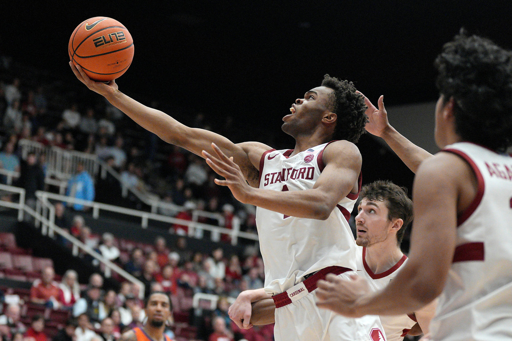 Stanford guard Ebuka Okorie (1) drives to the basket against Clemson during the first half of an NCAA college basketball game in Stanford, Calif., Wednesday, Feb. 4, 2026. (AP Photo/Tony Avelar)