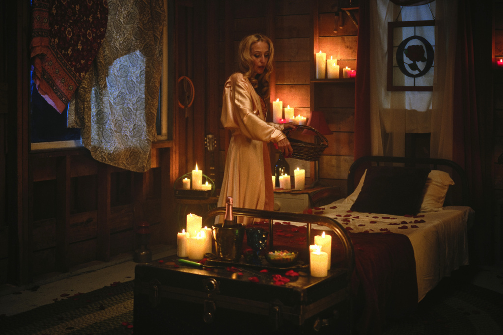 This image released by Mubi shows Gillian Anderson in a scene from "Teenage Sex and Death at Camp Miasma." (Ryan Plummer/Mubi via AP)