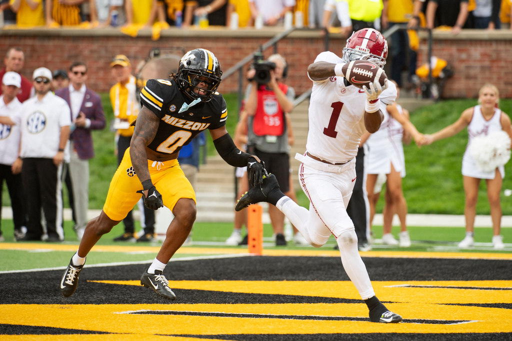 Alabama wide receiver Isaiah Horton (1) catches a touchdown pass in front Missouri cornerback Stephen Hall (0) during the first half an NCAA college football game Saturday, Oct. 11, 2025, in Columbia, Mo. (AP Photo/L.G. Patterson)