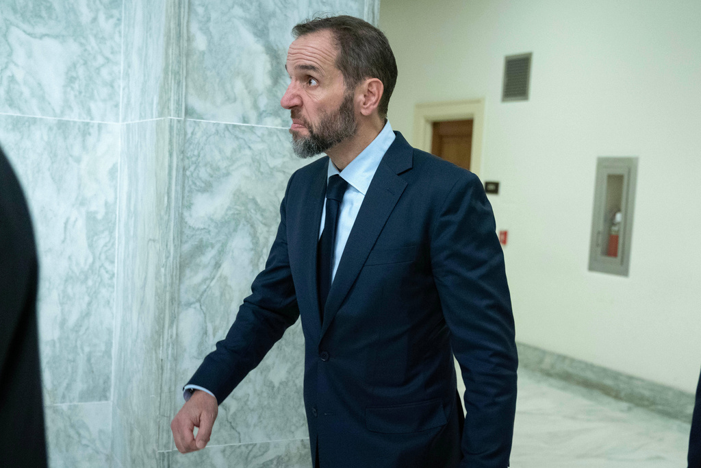 Former Department of Justice Special Counsel Jack Smith departs after his closed-door interview with House Republicans at Capitol Hill, Wednesday, Dec. 17, 2025, in Washington. (AP Photo/Jose Luis Magana)