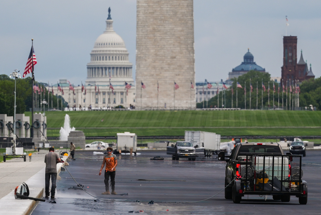 Work continues on the Lincoln Memorial Reflecting Pool, Tuesday, Aug. 18, 2026, in Washington. (AP Photo/Julia Demaree Nikhinson)