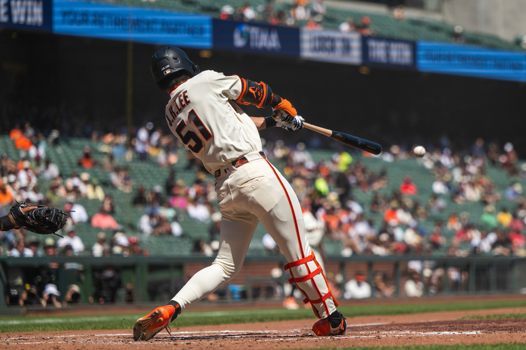 San Francisco Giants' Jung Hoo Lee (51) hits a single during the second inning of a baseball game against the St. Louis Cardinals in San Francisco, Wednesday, Sept. 9, 2026. (AP Photo/Nic Coury)