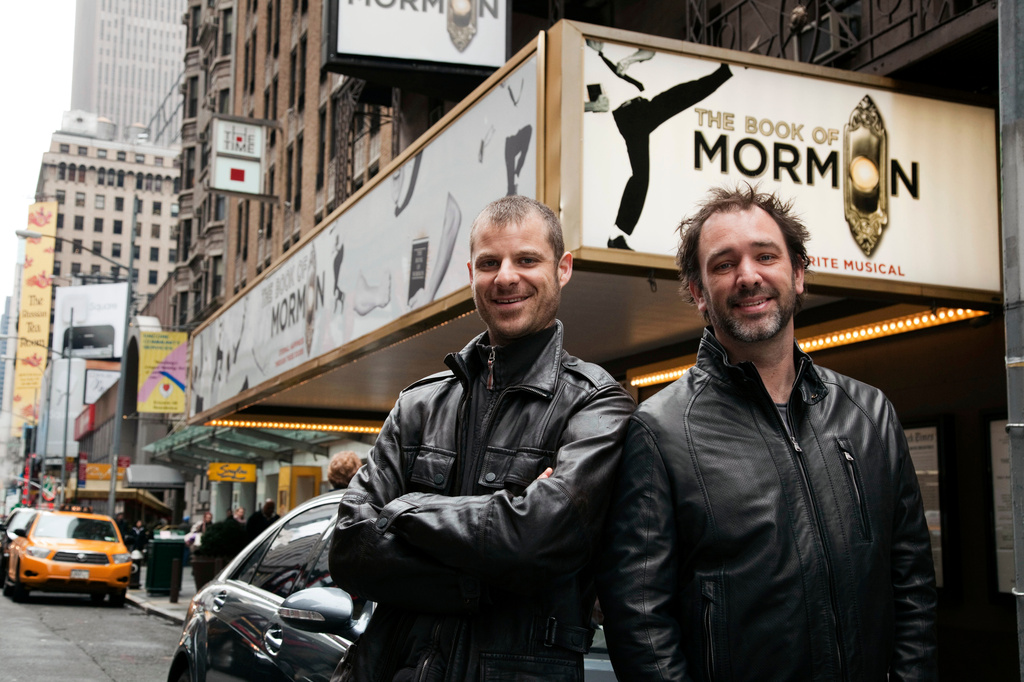 FILE - In this March 16, 2011 photo, Trey Parker, right, and Matt Stone, co-creators of the Broadway show "The Book of Mormon," pose for a portrait outside the Eugene O'Neill Theatre in New York. (AP Photo/Victoria Will, file)