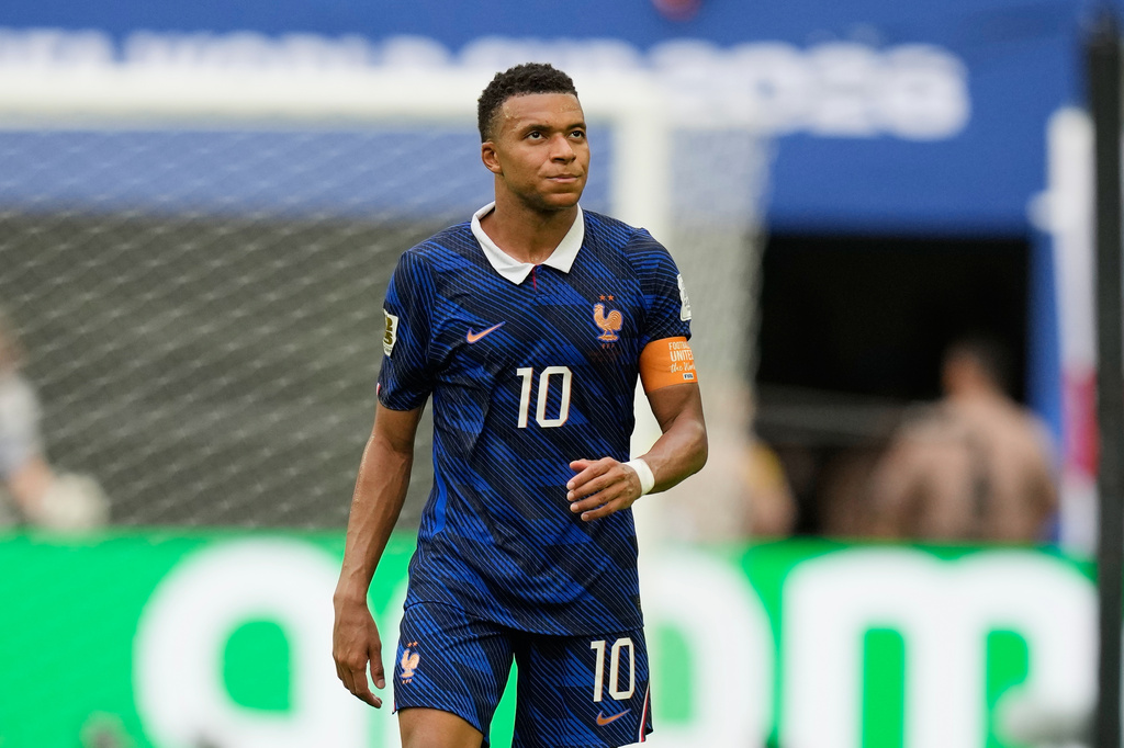 France's Kylian Mbappe (10) walks off the pttch after the World Cup third-place playoff soccer match between France and England in Miami Gardens, Fla., Saturday, July 18, 2026. (AP Photo/Rebecca Blackwell)