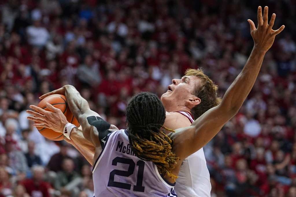 Indiana forward Reed Bailey (1) is fouled by Kansas State forward Khamari McGriff (21) in the second half of an NCAA college basketball game in Bloomington, Ind., Tuesday, Nov. 25, 2025. (AP Photo/Michael Conroy)
