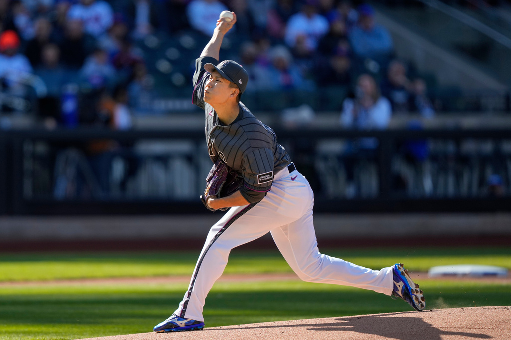 New York Mets pitcher Kodai Senga (34) throws during the first inning of a baseball game against the Athletics, Saturday, April 11, 2026, in New York. (AP Photo/Yuki Iwamura)