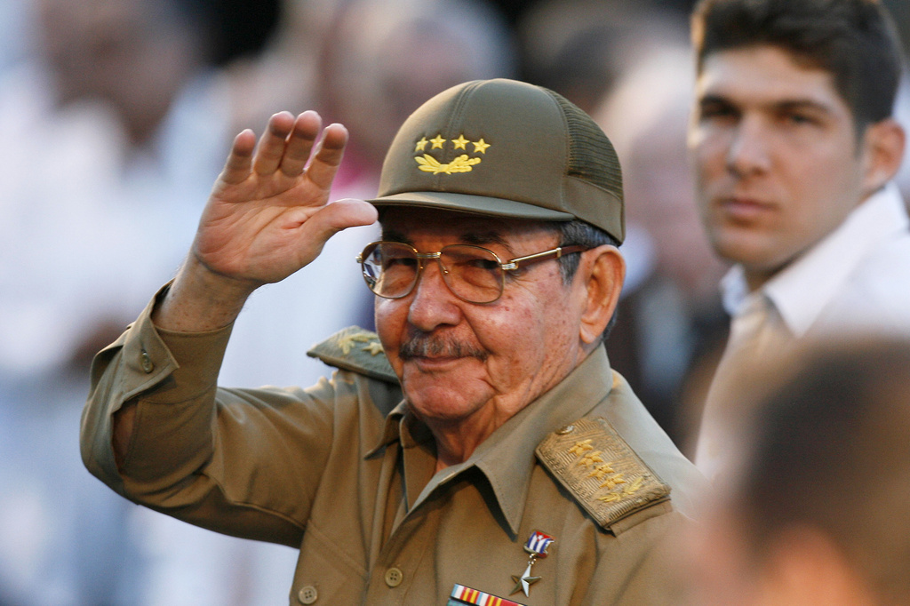FILE - Cuba's acting President Raul Castro waves to journalists in front the Museum of the Revolution in Havana on March 13, 2007. (AP Photo/Javier Galeano, File)