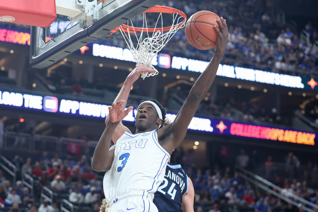 BYU forward AJ Dybantsa (3) shoots against Villanova forward Duke Brennan during the first half of an NCAA college basketball game, Monday, Nov. 3, 2025, in Las Vegas. (AP Photo/Ian Maule)