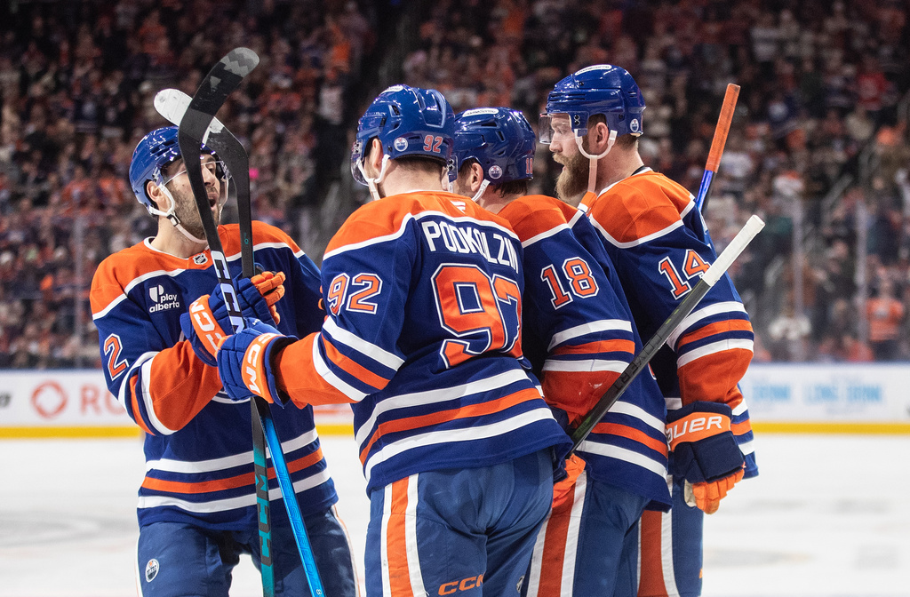 Edmonton Oilers celebrate a goal against the St. Louis Blues during second period NHL hockey action, in Edmonton on Sunday, Jan. 18, 2026. (Jason Franson/The Canadian Press via AP)