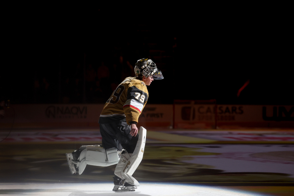 Vegas Golden Knights goaltender Carter Hart (79) skates after being named the third star of the game after shootout victory in an NHL hockey game against the Chicago Blackhawks Tuesday, Dec. 2, 2025, in Las Vegas. (AP Photo/Ian Maule)