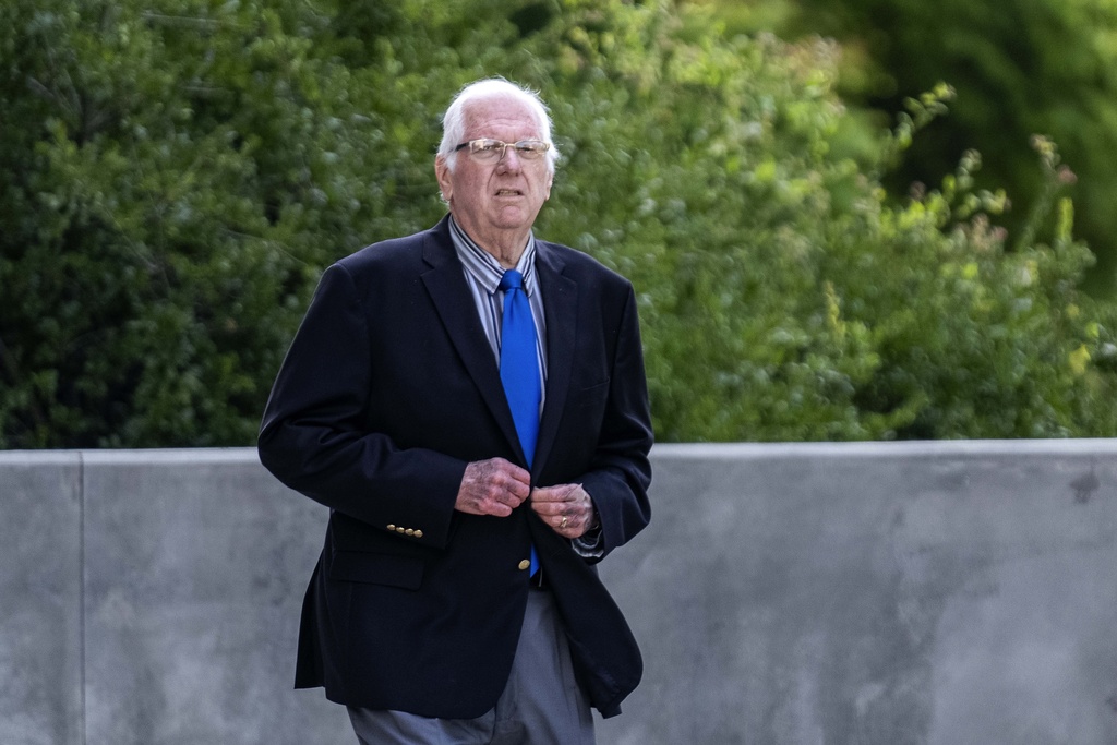 FILE -Orange County Superior Court Judge Jeffrey Ferguson walks out of court after attending a preliminary hearing in Los Angeles, June 20, 2024. (AP Photo/Damian Dovarganes), File)