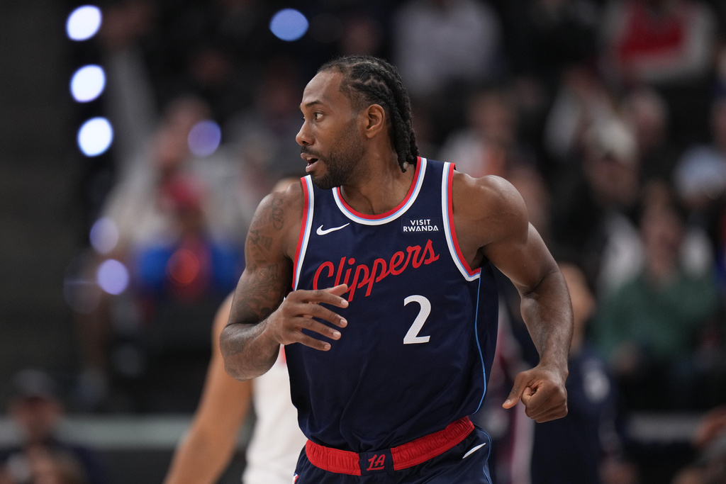 Los Angeles Clippers forward Kawhi Leonard (2) jogs up the court after making a basket during the first half of an NBA basketball game Monday, March 9, 2026, in Inglewood, Calif. (AP Photo/Jae C. Hong)