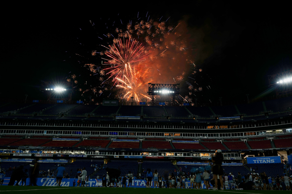 Fireworks light up the sky after a Tennessee Titans practice during the NFL football team's training camp Friday, Aug. 7, 2026, in Nashville, Tenn. (AP Photo/George Walker IV)
