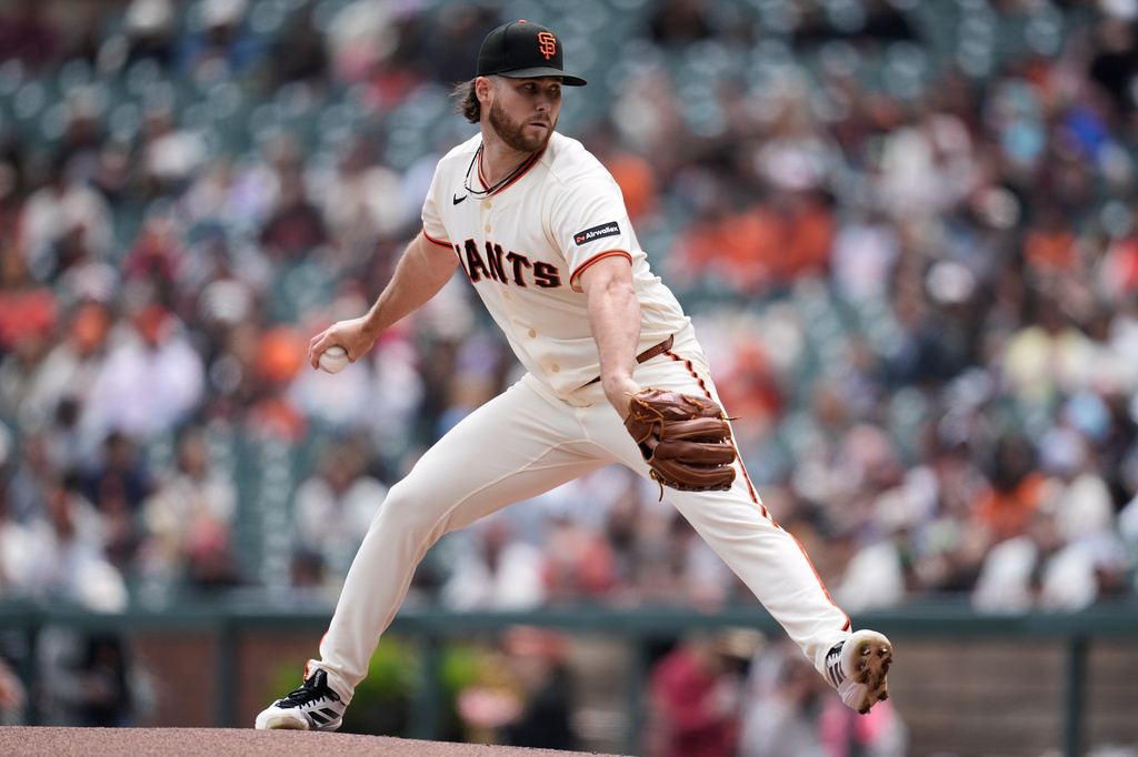 San Francisco Giants pitcher Landen Roupp throws against the Miami Marlins during the first inning of a baseball game Sunday, April 26, 2026, in San Francisco. (AP Photo/Jeff Chiu)