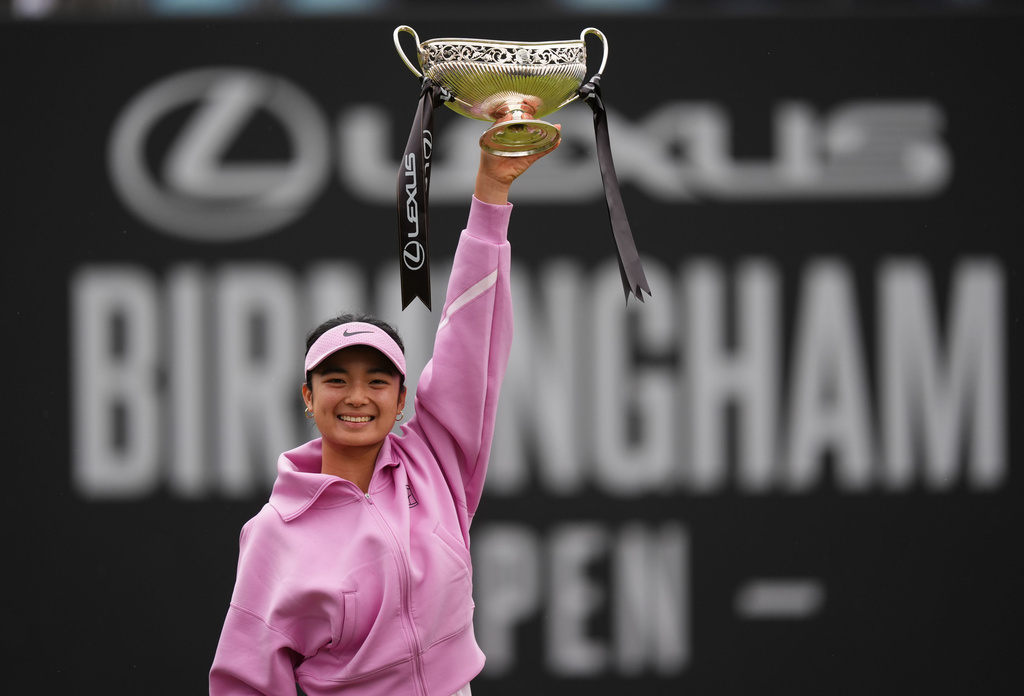 Philippines' Alexandra Eala celebrates winning her women's singles final match against Nikola Bartunkova on day nine of the Lexus Birmingham Open Championships at Edgbaston Priory Club, Birmingham, England, Sunday June 7, 2026. (Mike Egerton/PA via AP)