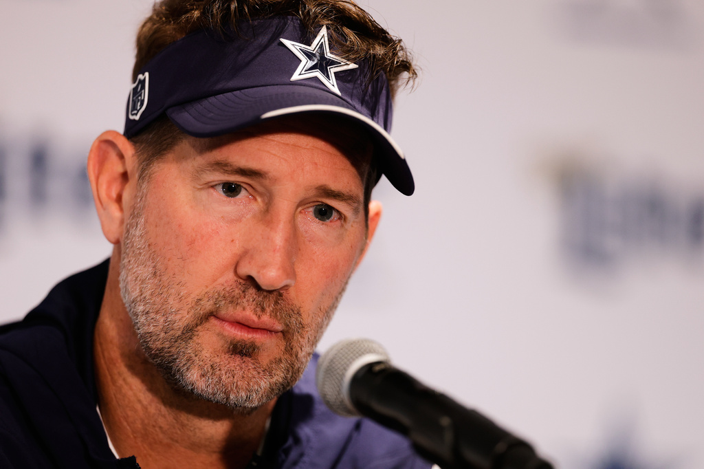 Dallas Cowboys head coach Brian Schottenheimer speaks during a practice for an NFL football game against the Baltimore Ravens in Rio de Janeiro, Friday, Sept. 25, 2026. (AP Photo/Lucas Figueiredo)
