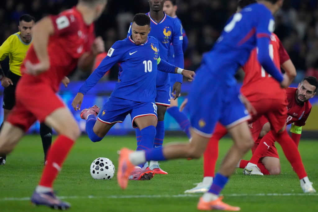 France's Kylian Mbappe shoots during a World Cup 2026 Group D qualifying soccer match between France and Azerbaijan in Paris, France, on Friday, Oct. 10, 2025. (AP Photo/Michel Euler)