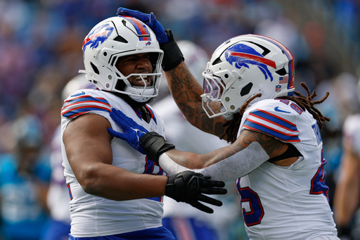 Buffalo Bills linebacker Shaq Thompson, right, celebrates after Buffalo Bills defensive tackle Ed Oliver, left, made a sack against the Carolina Panthers during the first half an NFL football game, Sunday, Oct. 26, 2025, in Charlotte, N.C. (AP Photo/Rusty Jones) Buffalo Bills linebacker Shaq Thompson, right, celebrates after Buffalo Bills defensive tackle Ed Oliver, left, made a sack against the Carolina Panthers during the first half an NFL football game, Sunday, Oct. 26, 2025, in Charlotte, N.C. (AP Photo/Rusty Jones)