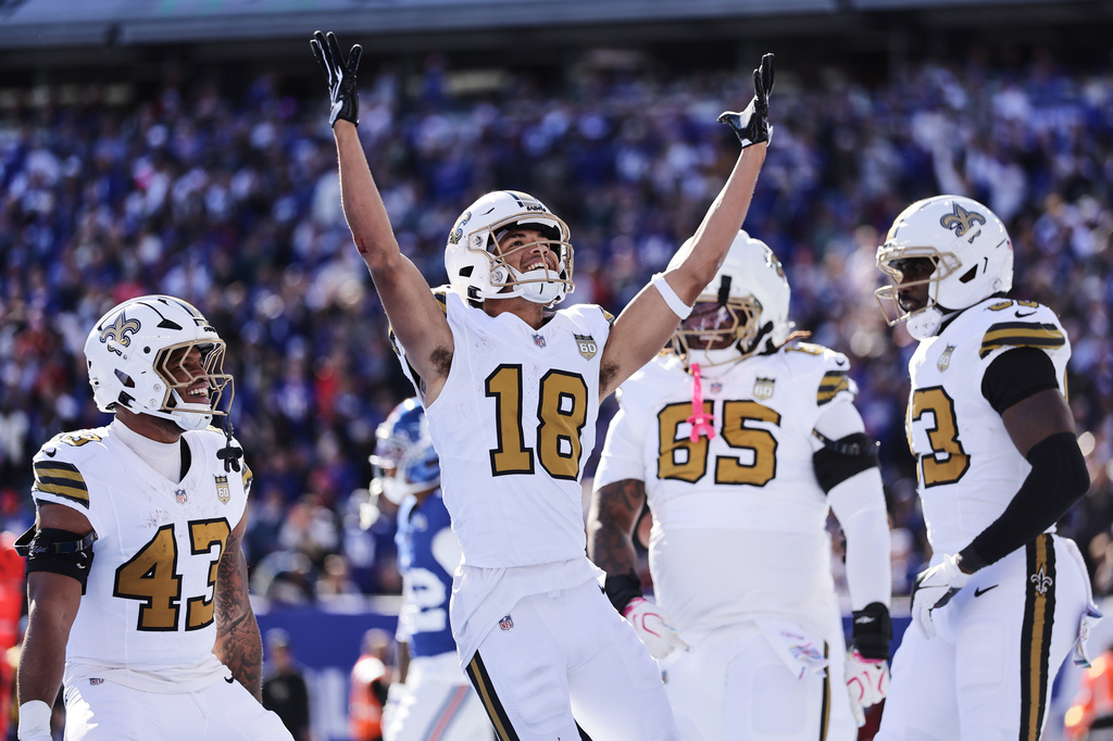 New Orleans Saints wide receiver Bryce Lance (18) celebrates a touchdown during the first half of an NFL football game against the New York Giants in East Rutherford, N.J., Sunday, Oct. 18, 2026. (AP Photo/Adam Hunger)