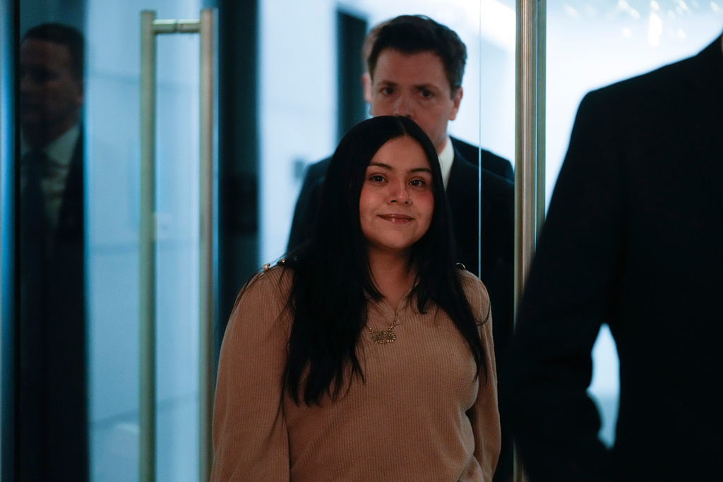 Marimar Martinez, a woman who was shot by a Border Patrol agent last year, arrives with her attorneys during a press conference Wednesday, Feb. 11, 2026, in Chicago. (AP Photo/Erin Hooley)