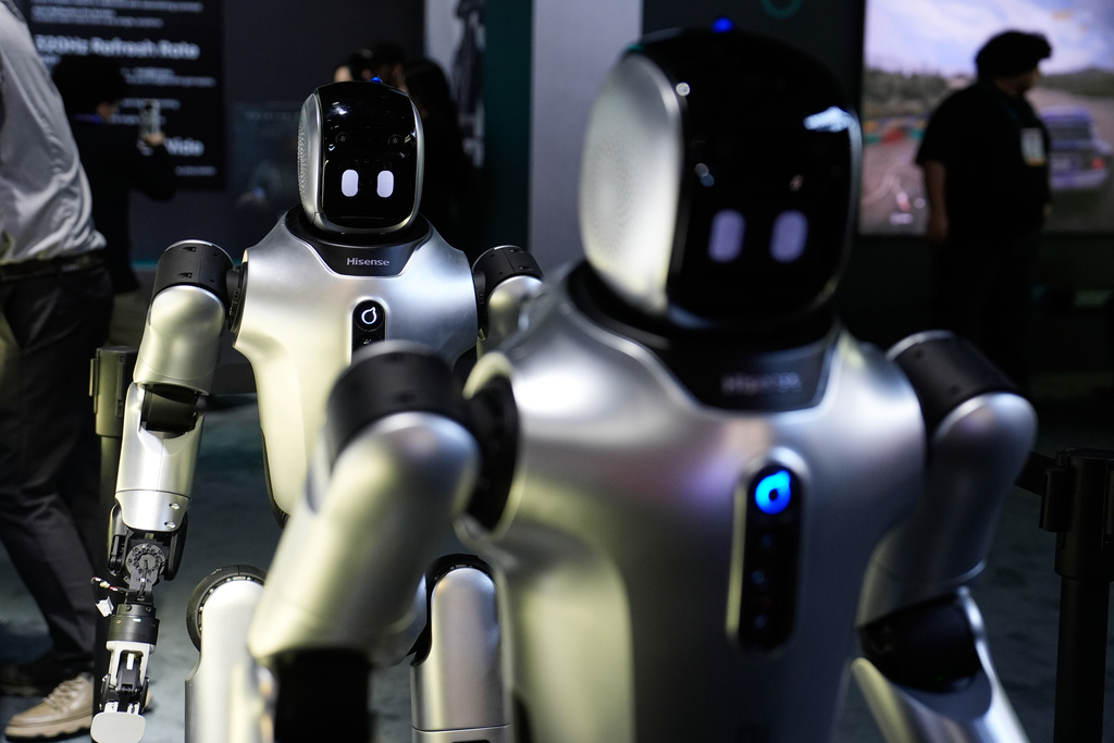 Harley humanoid service robots are seen on display at the Hisense booth during the CES tech show Wednesday, Jan. 7, 2026, in Las Vegas. (AP Photo/John Locher)
