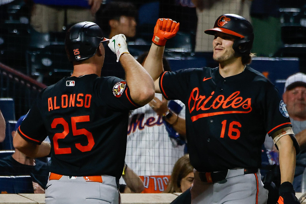 Baltimore Orioles Pete Alonso (25) celebrates a solo home run with his teammate Coby Mayo (16) during the first inning of a baseball game against the New York Mets, Wednesday, Sept. 16, 2026, in New York. (AP Photo/Eduardo Munoz Alvarez)