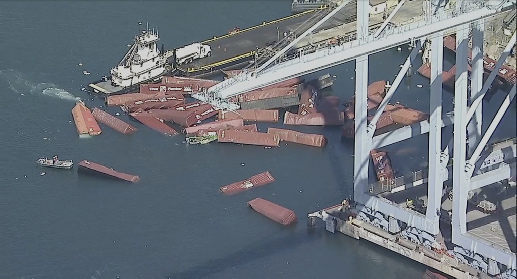 Several shipping containers have fallen off a cargo ship and into the water at the Port of Long Beach, Calif., on Tuesday, Sept. 9, 2025. (KABC-TV via AP)
